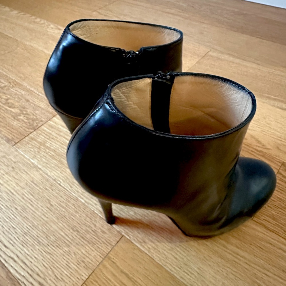Black leather Christian Louboutin booties. Size 36 (US 6)
